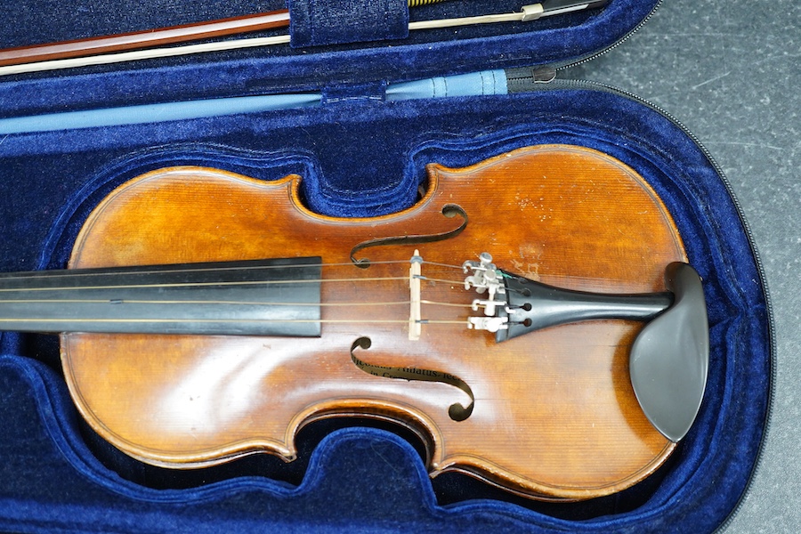 Three violins; a 3/4 Czech, a 1/2 size German and a 1/4 size Czech, all cased. Condition - fair to good